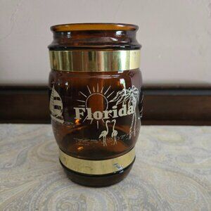 Vintage Siesta Ware amber glass souvenir mug featuring Florida-themed illustrat